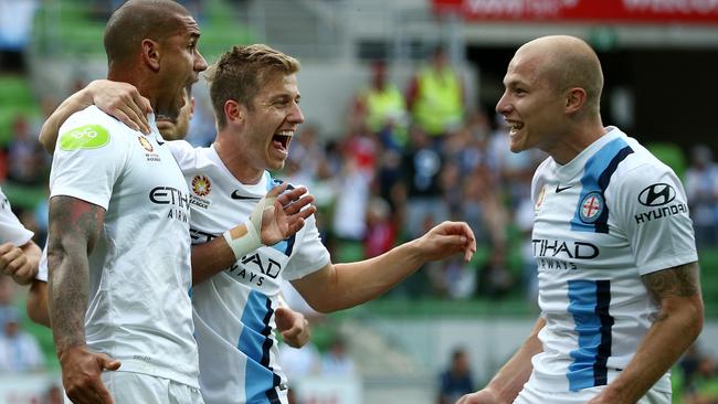 Patrick Kisnorbo hopes City can keep hold of star midfielder Aaron Mooy.