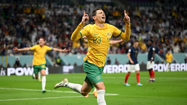 Craig Goodwin of Australia celebrates scoring his side's first goal during the FIFA World Cup Qatar 2022 Group D match between France and Australia.