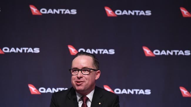 Qantas Group Chief Executive Officer Alan Joyce presents the company's half-year financial results in Sydney, Thursday, February 22, 2018. Qantas has announced an 18 percent profit increase. (AAP Image/Dean Lewins) NO ARCHIVING