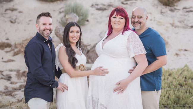 Ben and Sarah Wright with their pregnant surrogate, Danni Andrews, and her husband Troy Picture: Supplied