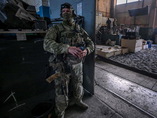 Russian serviceman stands guard at a private Berdyansk foundry in Berdyansk, amid the ongoing Russian military action in Ukraine. Picture: AFP