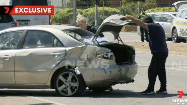 A driver is in custody after a dramatic pursuit in the northern suburbs. The Elizabeth Park man was arrested after he slammed into an innocent motorist and tried to flee on foot. Picture: 7NEWS