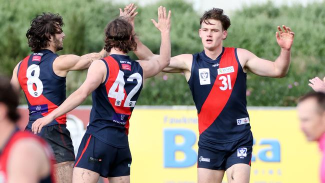 Aaron Clarke celebrates a goal for Coburg. Picture: George Salpigtidis