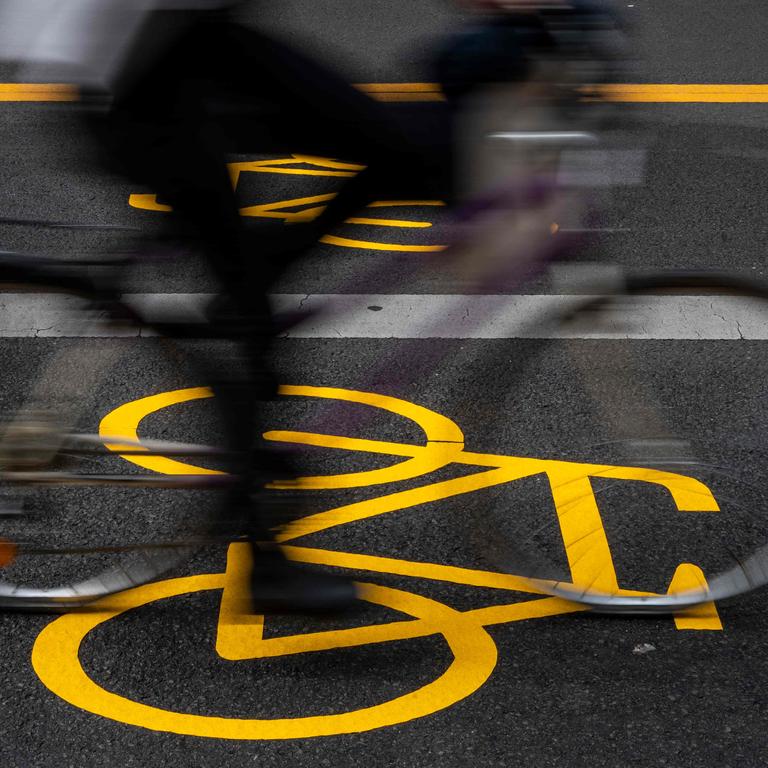 The administration costs to charge cyclists registration fees would outweigh the benefits, Queensland Transport and Main Roads Department said. Picture: John Macdougall/AFP