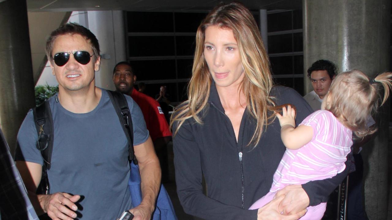 Renner and Pacheco at LAX with their daughter Ava in 2014. Picture: SNAPSNAP