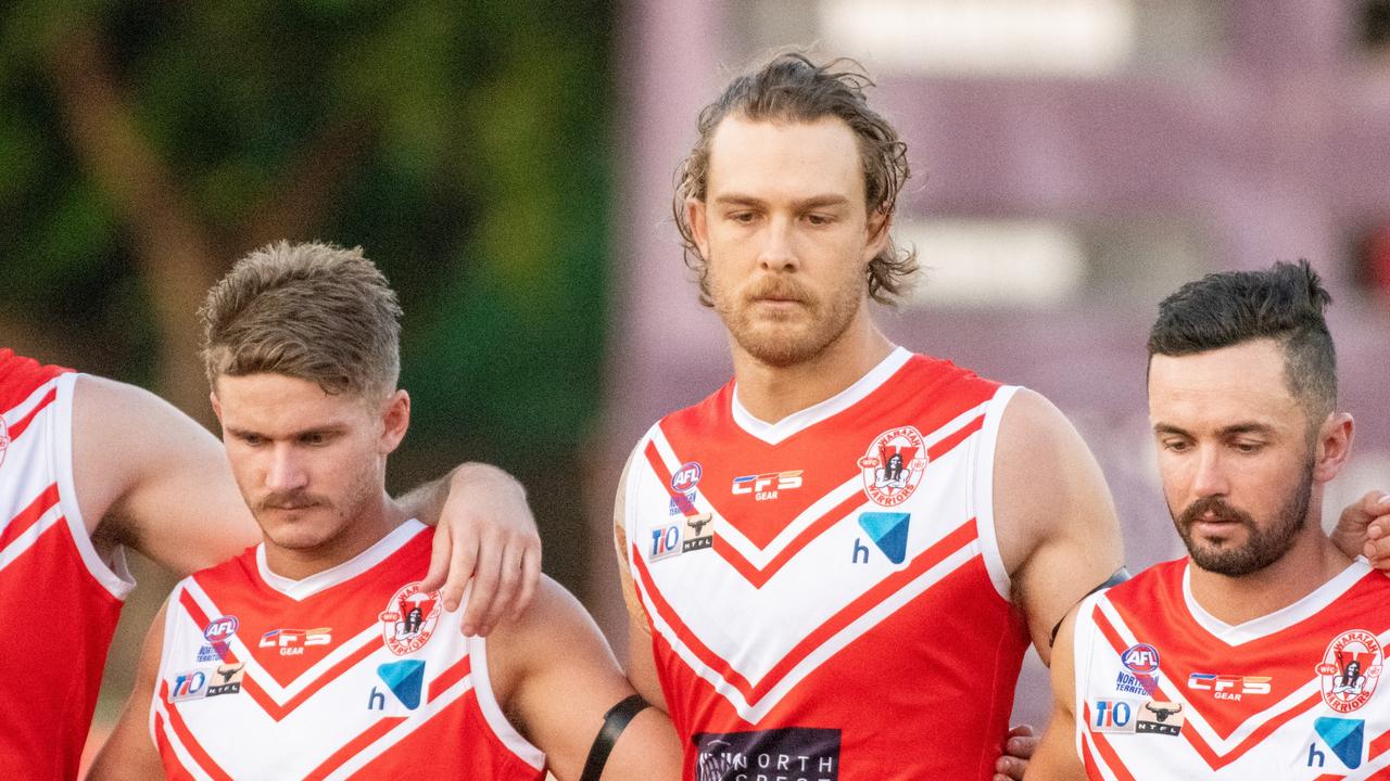 The Waratahs pay tribute to late, great ruckman Alexander ‘Rooch’ Aurrichio at the first game under lights at Gardens Oval. Picture: Aaron Black/AFLNT Media