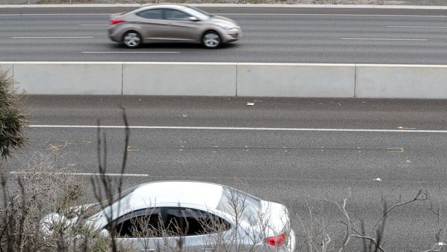 Three teenagers have been arrested over rocks thrown at cars on the Southern Expressway.