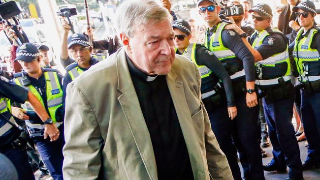 Cardinal George Pell arrives at court last year; his relentless silence has grated with many observers. Picture: AP