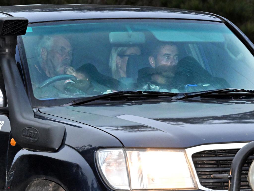 Family members arrive at a rural property on Jerrara Rd, Bungonia in the Southern Tablelands, 170km southwest of Sydney. Picture: AAP