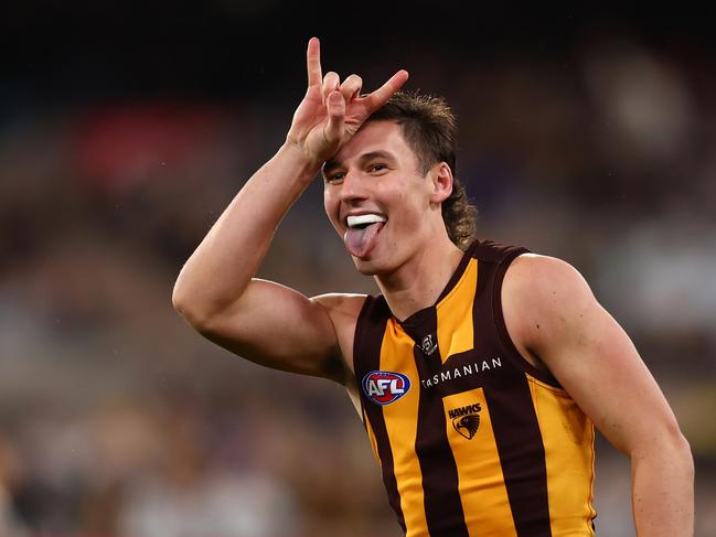 MELBOURNE, AUSTRALIA - JULY 20: Connor Macdonald of the Hawks celebrates kicking a goal during the round 19 AFL match between Hawthorn Hawks and Collingwood Magpies at Melbourne Cricket Ground on July 20, 2024 in Melbourne, Australia. (Photo by Graham Denholm/AFL Photos/via Getty Images)