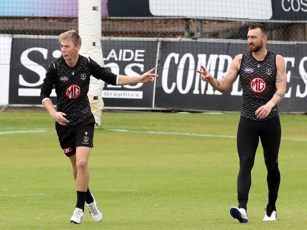 Todd Marshall (pictured with Charlie Dixon at training) is valued within the team if not by the fan base. Picture: Sarah Reed