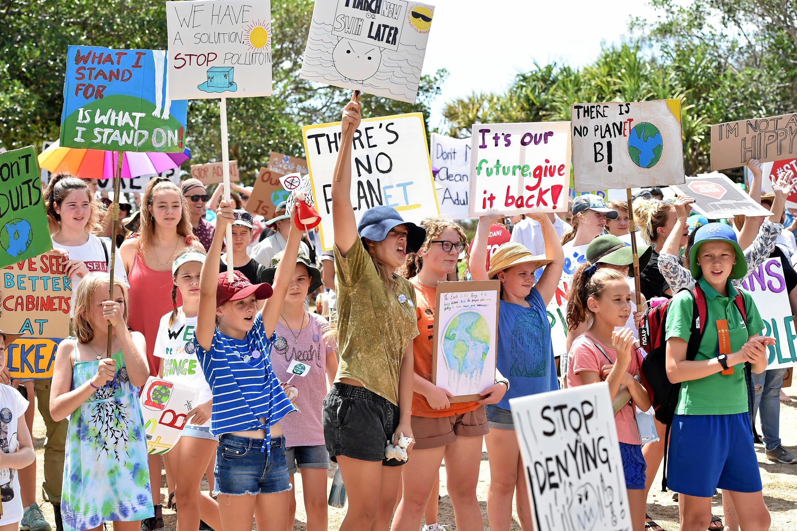 School students and community members gather at Peregain Beach to tell our politicians to take all them seriously and start treating climate change for what it is: a crisis and the biggest threat to our generation and gererations to come. Picture: Patrick Woods