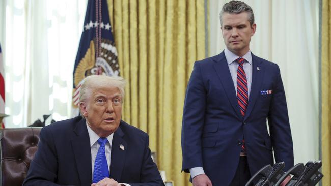 Donald Trump with Secretary of Defence Pete Hegseth in the White House. Picture: Pool via AP)