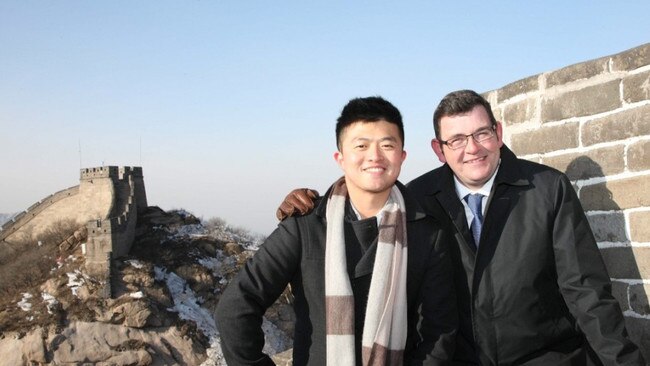 Daniel Andrews alongside Mike Yang at the Great Wall of China in 2018.