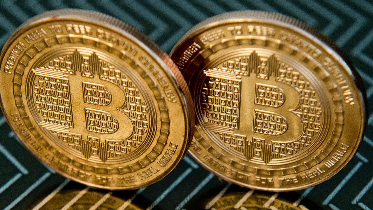 A US company who’s systems were hit by a cyber attack and were forced to pay a ransom in bitcoin have had the money recovered but its worth way less. Picture: Karen Bleier/AFP