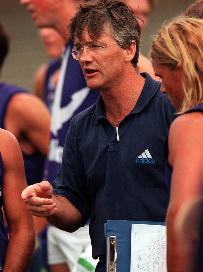 Drum chats to his players during a match in 1999.