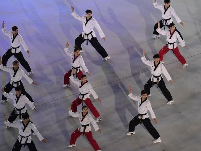 Martial arts artists perform prior to the opening ceremony. Picture: AFP/Javier Soriano