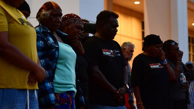 Warlpiri community leaders stood outside the NT Parliament on Wednesday during a vigil for Kumanjayi White, a 24-year-old Yuendumu man with a disability who died after being restrained by police in the Alice Springs Coles. Picture: Zizi Averill