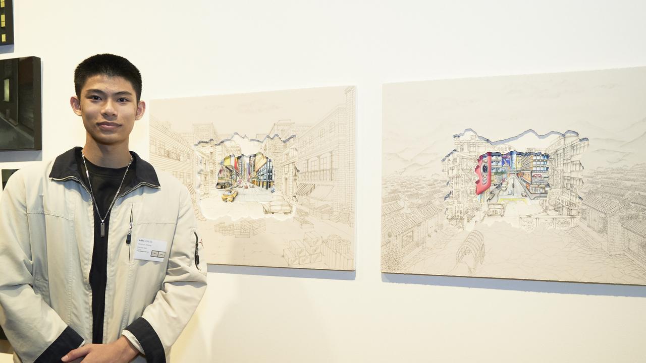 Kendrick Cheung, Killara High School, with his work, 'Urban metamorphosis'. Picture: Mim Stirling