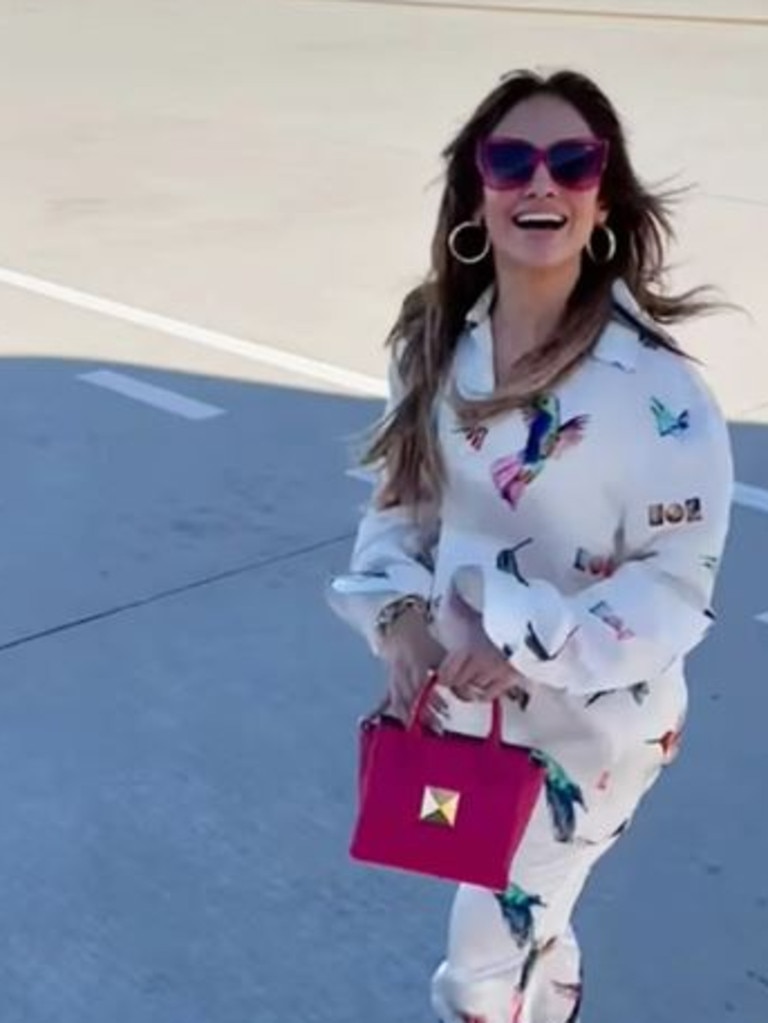 Jennifer Lopez looked in high spirits as she boarded a private jet in luxurious silk pyjamas and designer accessories. Picture: jenniferlopez/Instagram