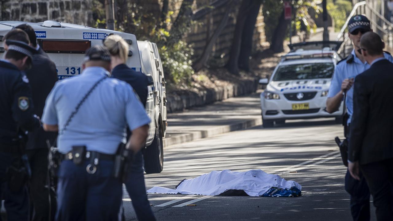 Jett McKee’s body lies on the road in Forest Lodge in suburban Sydney in August, 2018, after he was struck by a sword. Picture: Brook Mitchell/Getty Images