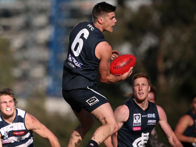 Glenn Strachan takes a mark for Northern Blues. Picture: Mark Dadswell