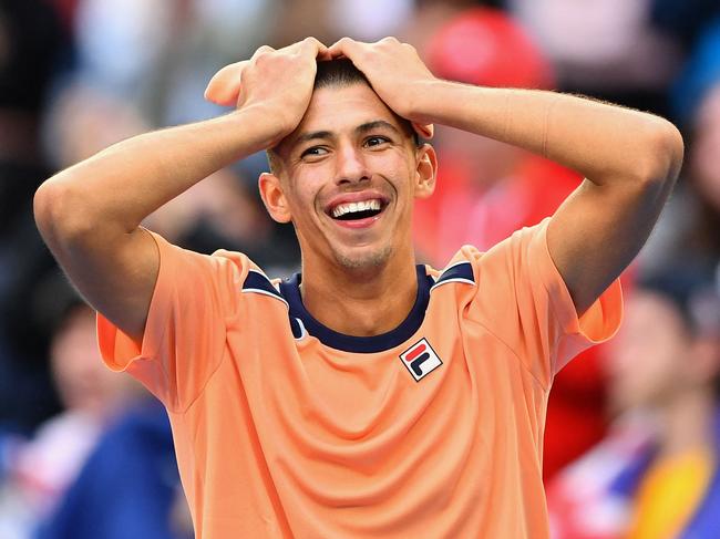 Australia's Alexei Popyrin celebrates after beating Taylor Fritz of the US during their men's singles match on day four of the Australian Open tennis tournament in Melbourne on January 19, 2023. (Photo by Paul CROCK / AFP) / -- IMAGE RESTRICTED TO EDITORIAL USE - STRICTLY NO COMMERCIAL USE --