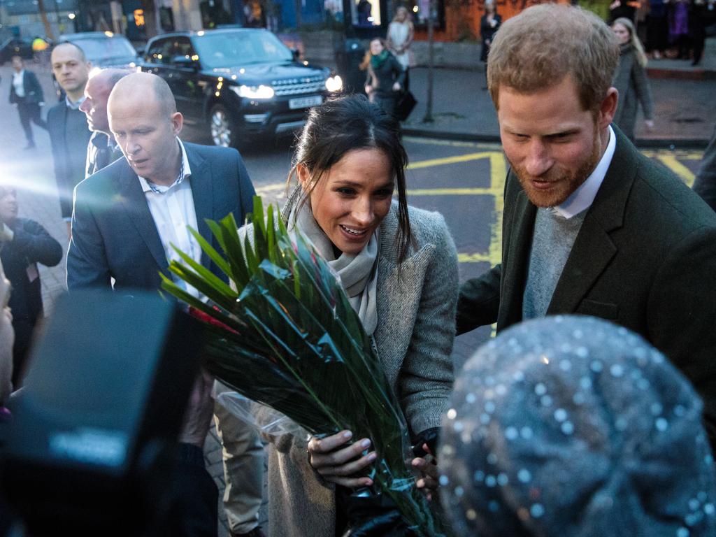 Prince Harry and Meghan Markle meet well-wishers during a visit to Reprezent 107.3FM on January 9, 2018 in London, England. The Reprezent training programme was established in Peckham in 2008, in response to the alarming rise in knife crime, to help young people develop and socialise through radio. Picture: Getty Images