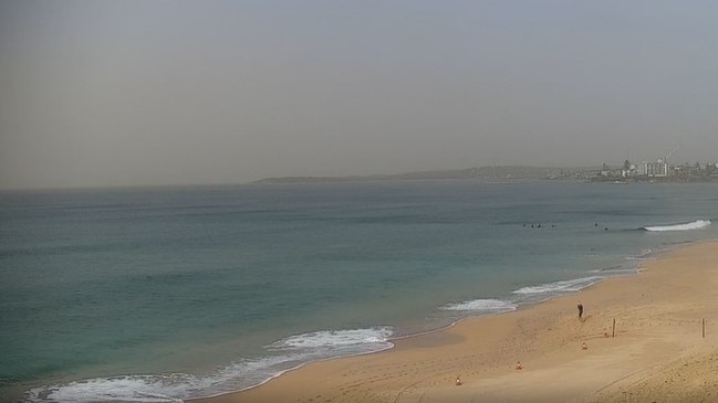 Dust haze visible off Wanda beach on Tuesday morning. Picture: NSW Government