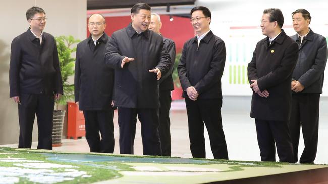 Chinese President Xi Jinping listens to the introduction of the general plan, policy system and construction of the Xiongan New Area at the Xiongan citizen service centre during his inspection in the Xiongan New Area, north China s Hebei Province, January 16, 2019. Picture: Alamy