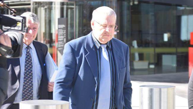 David Brooke (centre) with his legal team. Picture: Sam Turner