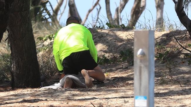 The man was seen in the dunes on December 2 near Southport Surf Life Saving Club. Picture: Scott Powick.