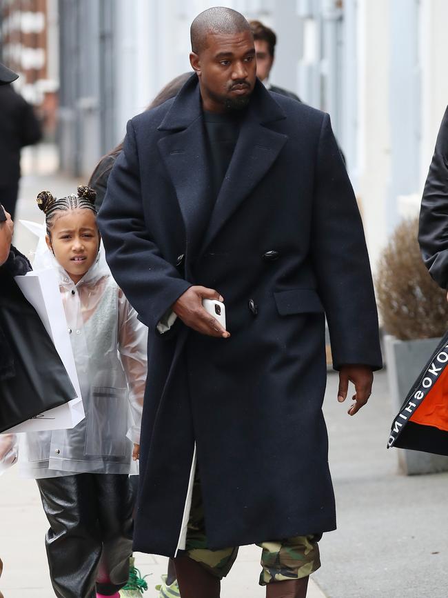 Kanye West seen leaving Michiko Sushino restaurant with daughter North West in London, England. (Picture: Neil Mockford/GC Images