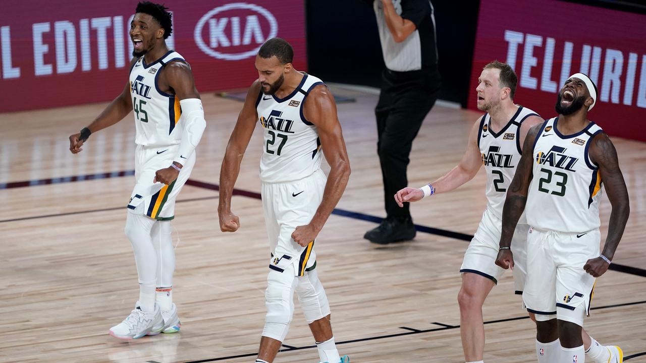 Utah Jazz players, including Australian star Joe Ingles, celebrate Thursday’s game 2 win over Denver to level the series at 1-all. Photo: Ashley Landis-Pool/Getty Images.