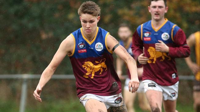 Kain Hall chases the footy for South Morang. Picture: Hamish Blair