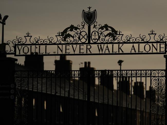 LIVERPOOL,  - MARCH 13: Dusk falls over The Shankly Gates at the home of Liverpool Football Club on March 13, 2020 in Liverpool, United Kingdom. It has been announced that all football league matches, including the Premier League and Womens Super League, have been postponed until at least April 3 in response to the threat of coronavirus. This follows UEFA's decision to suspend fixtures in the Champion's League and the Europa League, as many top flight players enter self-isolation.  (Photo by Christopher Furlong/Getty Images)