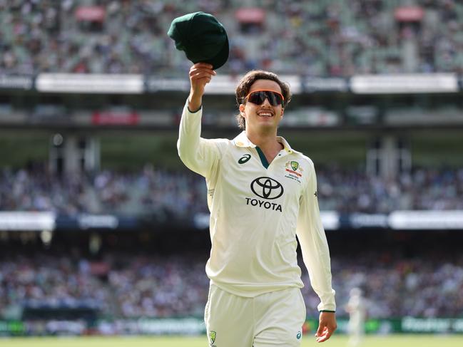 MELBOURNE, AUSTRALIA - DECEMBER 27: Sam Konstas of Australia lifts his cap towards the crowd during day two of the Men's Fourth Test Match in the series between Australia and India at Melbourne Cricket Ground on December 27, 2024 in Melbourne, Australia. (Photo by Robert Cianflone/Getty Images)