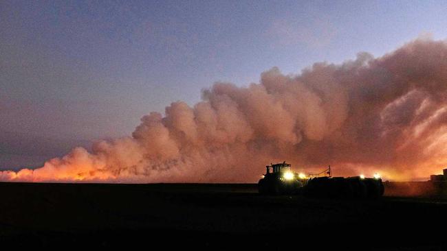 FARM FLAMES: NewsMail photographer Mike Knott took these photos of a cane fire on Windermere Rd, Qunaba. Picture: Mike Knott BUN300719FIRE3