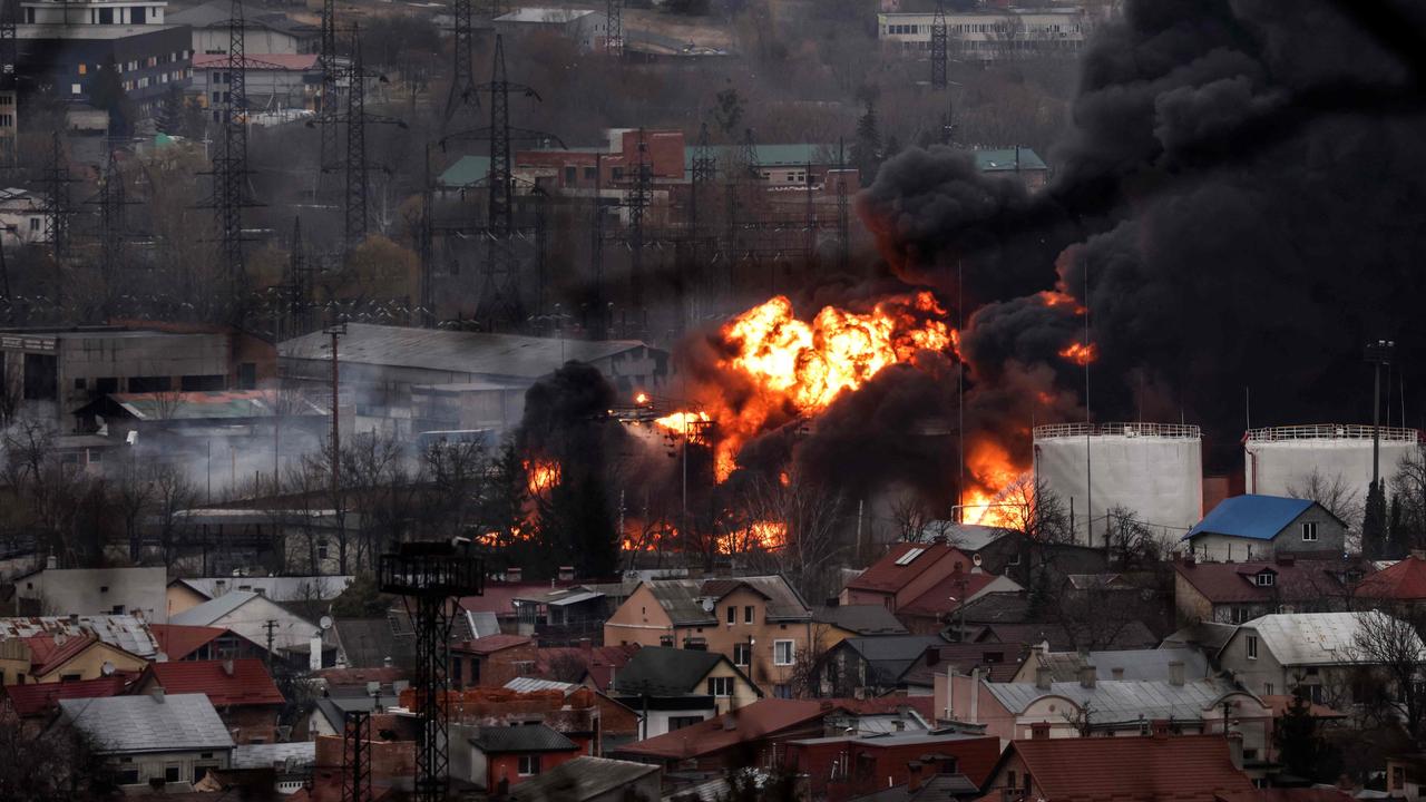 At least five people were wounded after Russian missiles struck a fuel depot in Lviv. Picture: Ronaldo Schemidt/AFP