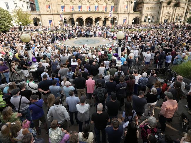 People attend a vigil outside the Atkinson venue in central Southport. Picture: Getty Images