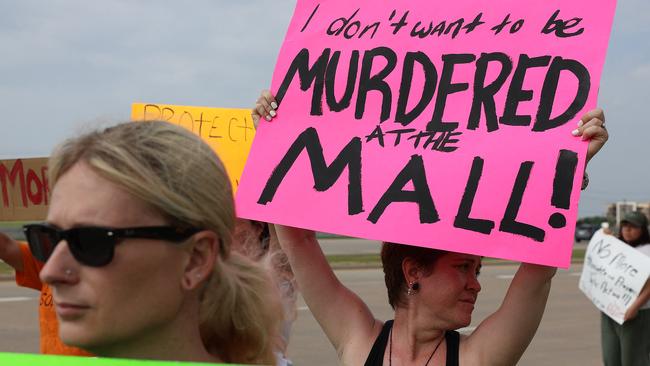 People protest against gun violence outside of the Cottonwood Creek Baptist Church on May 7, 2023 in Allen, Texas, for victims of the mass shooting in the Allen Premium Outlets mall. (Photo by JOE RAEDLE / GETTY IMAGES NORTH AMERICA / Getty Images via AFP)