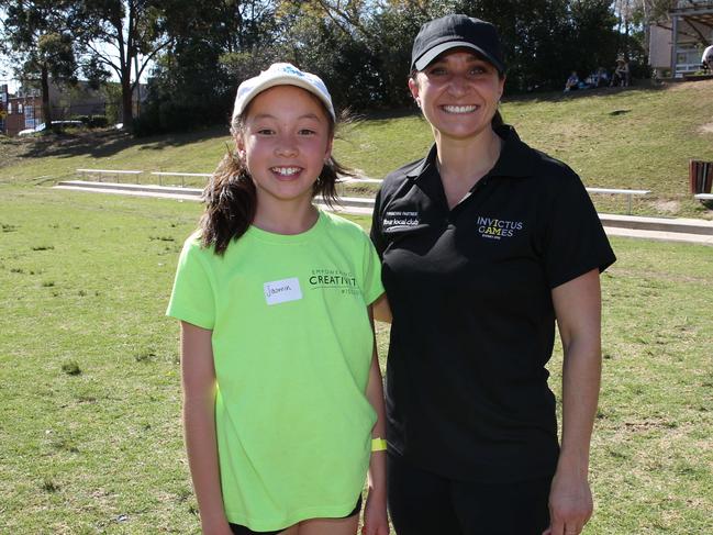 Local young Hills athletes will be meeting Invictus Games athlete and ambassador Gwen Cherne at Castle Hill High School.Gwen together with Jasmine Wong 11. Castle Hill, NSW, Australia, 15 September 2018. (AAP Image/ Annika Enderborg)