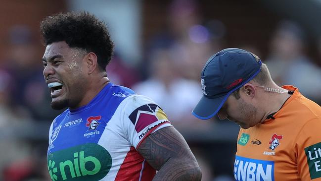 SYDNEY, AUSTRALIA - JULY 14: Greg Marzhew of the Knights is attended to by a trainer during the round 19 NRL match between Manly Sea Eagles and Newcastle Knights at 4 Pines Park on July 14, 2024 in Sydney, Australia. (Photo by Jason McCawley/Getty Images)