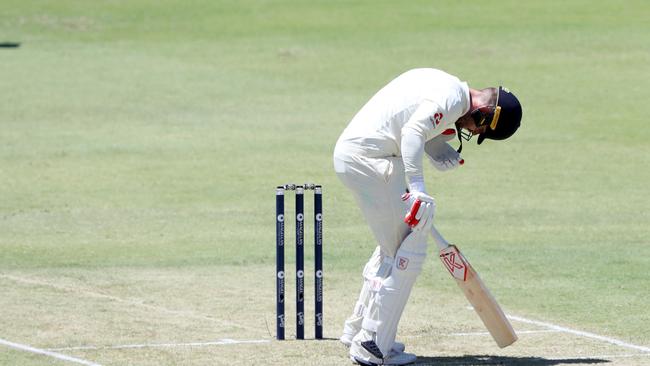 Mark Stoneman of England reacts after being hit on the head from a delivery from Josh Hazlewood of Australia on Day 1 of the Third Test match between Australia and England at the WACA in Perth, Thursday, December 14, 2017. (AAP Image/Richard Wainwright) NO ARCHIVING, EDITORIAL USE ONLY, IMAGES TO BE USED FOR NEWS REPORTING PURPOSES ONLY, NO COMMERCIAL USE WHATSOEVER, NO USE IN BOOKS WITHOUT PRIOR WRITTEN CONSENT FROM AAP