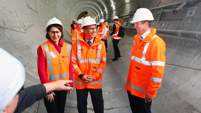 Gladys Berejiklian with the minister for transport and infrastructure Andrew Constance and NSW Premier Mike Baird at a tunnel for the North West Metro. Picture” Phillip Rogers