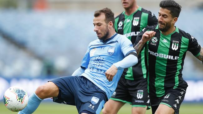 Sydney goalscorer Adam Le Fondre holds off Western United’s Panagiotis Kone. Picture: Getty Images