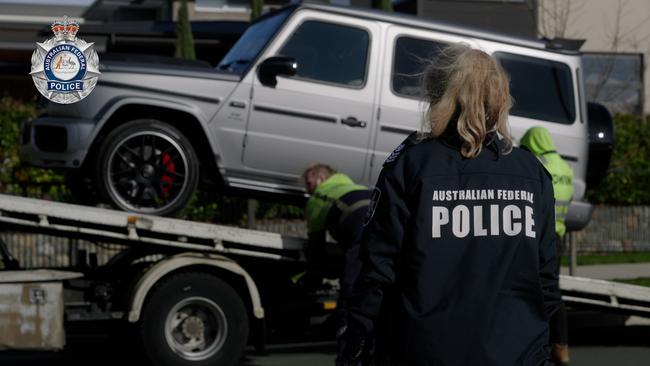 A car is taken away from the scene Picture: Australian Federal Police