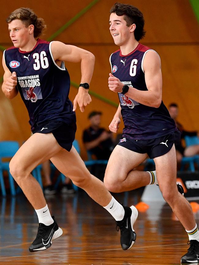 Cooper Lord and Billy McGee-Galimberti. (Photo by Josh Chadwick/AFL Photos via Getty Images)