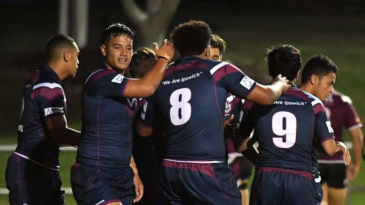 CLOSE BOND: Ipswich State High School students celebrate a try during the Langer Cup rugby league final at the North Ipswich Reserve. Picture: Rob Williams