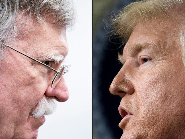 Mr Bolton and his former boss, Mr Trump. Mr Bolton has been accused of being bitter after he was sent packing from the White House. Picture: AFP